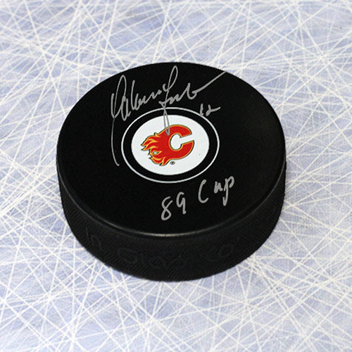 Hakan Loob Calgary Flames Autographed Hockey Puck with 1989 Cup Note