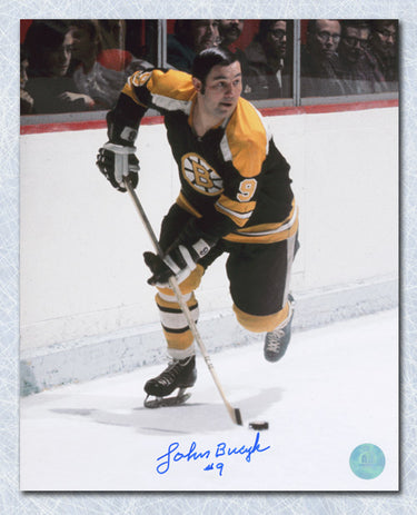 Johnny Bucyk Autographed Boston Bruins Puck Rush 8x10 Photo