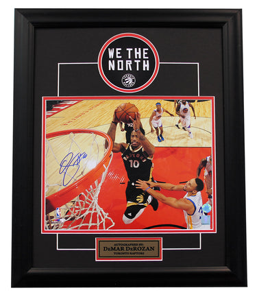 DeMar Derozan Toronto Raptors Autographed Netcam Dunk Over Curry 20x24 Frame