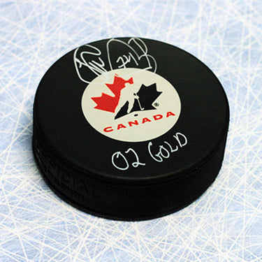 Theo Fleury Team Canada Autographed Hockey Puck with 02 Gold Note